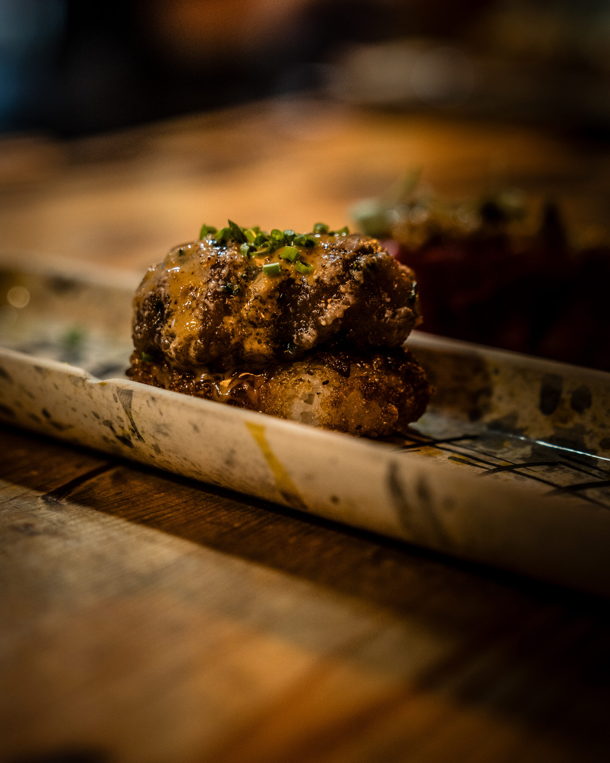 Croqueta de maíz, presa ibérica y Huitlacoche